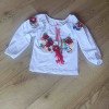 Дитяча трикотажна вишиванка-футболка з довгим рукавом та квітковим орнаментом