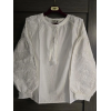 Біла вишиванка в етно стилі з білим вишитим орнаментом 
