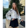 Белая нежная вышиванка с цветочной вышивкой